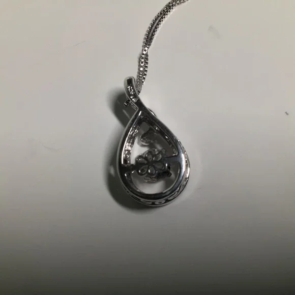 Kay Jewelers Infinity Teardrop Pendant with Free-floating Stone. - Picture 3 of 10